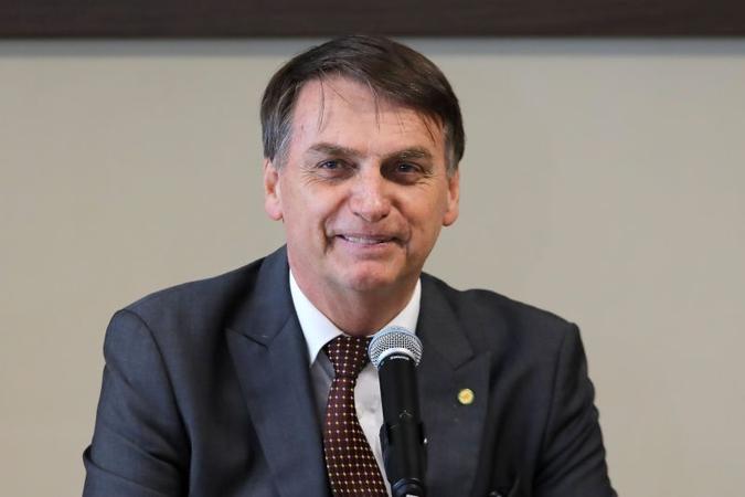 Bolsonaro participou de uma cerimônia do aniversário de 73 anos da brigada da Infantaria de Paraquedista, no Rio de Janeiro(foto: AFP/Sergio Lima) Bolsonaro participou de uma cerimônia do aniversário de 73 anos da brigada da Infantaria de Paraquedista, no Rio de Janeiro(foto: AFP/Sergio Lima)