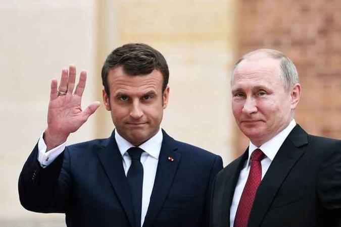 Emannuel Macron e Vladimir Putin(foto: Stephane de Sakutin/AFP) Emannuel Macron e Vladimir Putin(foto: Stephane de Sakutin/AFP)