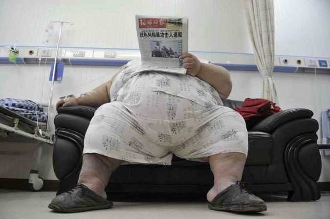 A pesquisa mostra que a obesidade está associada a 12 tipos de cânceres e responde por 8,9% dos casos em homens e 9,9% em mulheres(foto: Shi Tou/Reuters) A pesquisa mostra que a obesidade está associada a 12 tipos de cânceres e responde por 8,9% dos casos em homens e 9,9% em mulheres(foto: Shi Tou/Reuters)