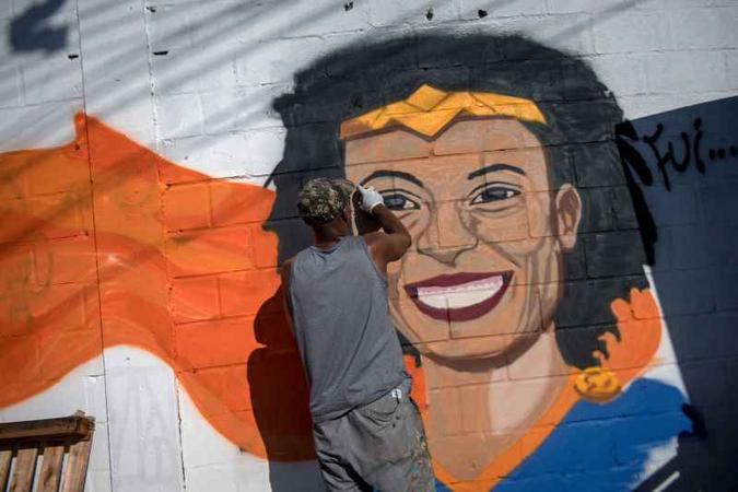 Homenagem a Marielle Franco na favela da Maré, no Rio de Janeiro(foto: AFP / Mauro PIMENTEL) Homenagem a Marielle Franco na favela da Maré, no Rio de Janeiro(foto: AFP / Mauro PIMENTEL)