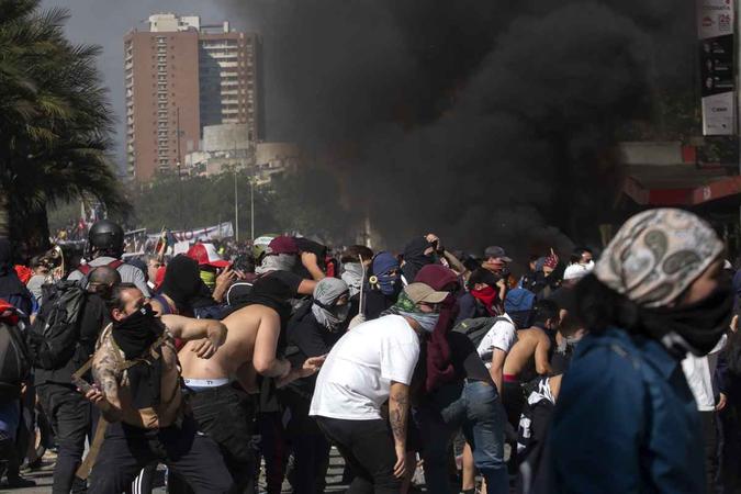 Número de mortos em protestos no Chile aumenta para 15(foto: Claudio Reyes / AFP) Número de mortos em protestos no Chile aumenta para 15(foto: Claudio Reyes / AFP)