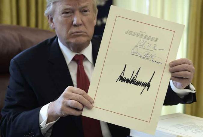 A Lei de Arquivos Presidenciais exige que todo documento tocado pelo presidente (memos, cartas, e-mails) deve ser conservado e enviado ao Arquivo Nacional como parte do registro histórico(foto: Brendan Smialowski/AFP ) A Lei de Arquivos Presidenciais exige que todo documento tocado pelo presidente (memos, cartas, e-mails) deve ser conservado e enviado ao Arquivo Nacional como parte do registro histórico(foto: Brendan Smialowski/AFP )