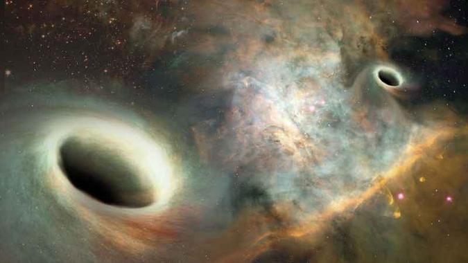 Simulação dos buracos negros gravitando próximos: um orbita o outro há 30 mil anos(foto: Josh Valenzuela/UNM/Divulgação) Simulação dos buracos negros gravitando próximos: um orbita o outro há 30 mil anos(foto: Josh Valenzuela/UNM/Divulgação)