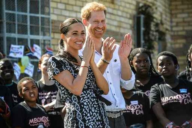 Príncipe Harry e a duquesa de Sussex Meghan.(foto: Courtney Africa/AFP) Príncipe Harry e a duquesa de Sussex Meghan.(foto: Courtney Africa/AFP)