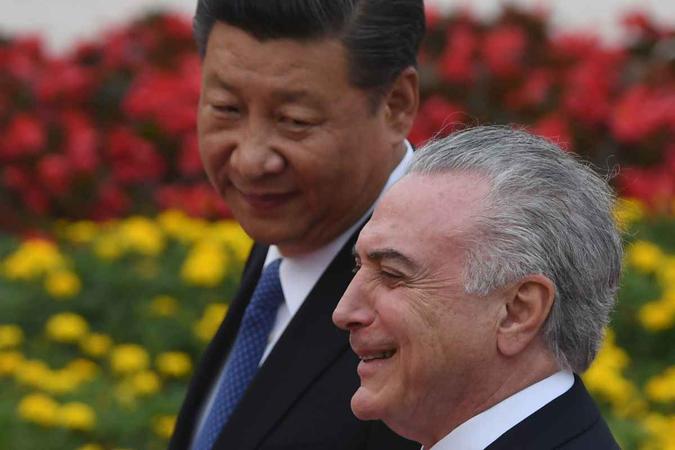Os presidentes da China e do Brasil se encontram em reunião do Brics(foto: GREG BAKER / AFP) Os presidentes da China e do Brasil se encontram em reunião do Brics(foto: GREG BAKER / AFP)