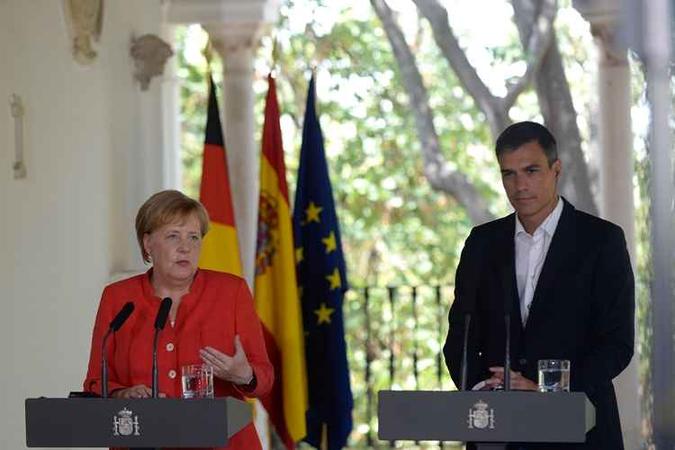 Os dois dirigentes concordaram que precisam reforçar a cooperação com o país de origem e trânsito que o Marrocos representa(foto: Cristina Quicler/AFP) Os dois dirigentes concordaram que precisam reforçar a cooperação com o país de origem e trânsito que o Marrocos representa(foto: Cristina Quicler/AFP)