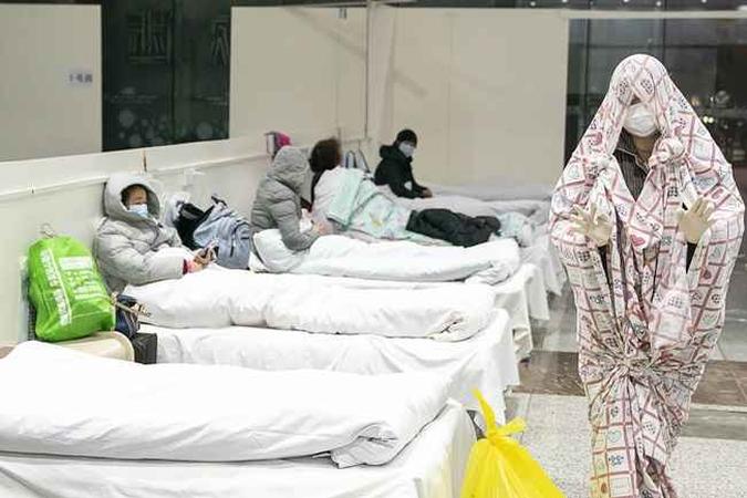Número de mortos pela epidemia do novo coronavírus subiu para 563 na China continental (sem contar Hong Kong e Macau).(foto: STR / AFP) Número de mortos pela epidemia do novo coronavírus subiu para 563 na China continental (sem contar Hong Kong e Macau).(foto: STR / AFP)
