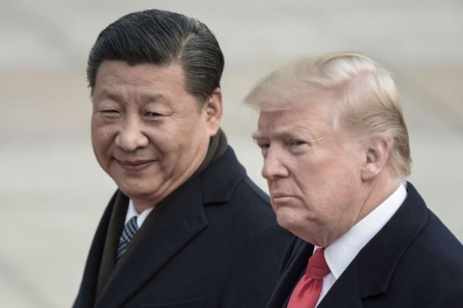 Xi Jinping e Donald Trump expressaram a intenção por meio de mensagens(foto: AFP / FRED DUFOUR) Xi Jinping e Donald Trump expressaram a intenção por meio de mensagens(foto: AFP / FRED DUFOUR)