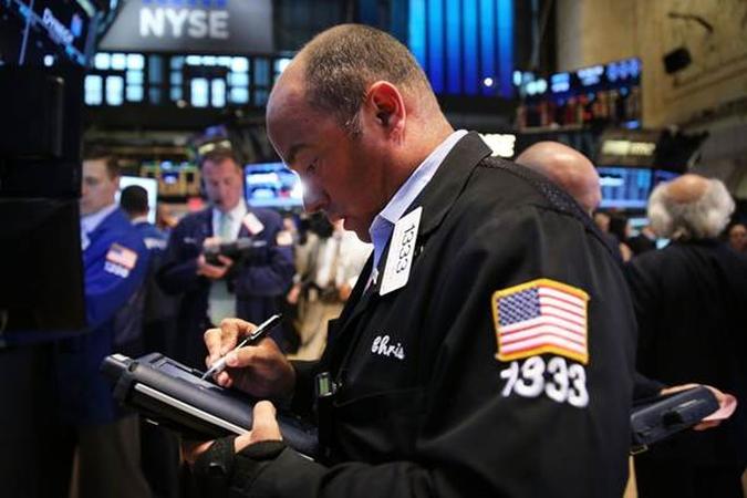 Notícias globais também afetam os mercados, como a Bolsa de Nova York, que mostrou estabilidade nessa quarta-feira (27/8)(foto: Spencer Platt/AFP) Notícias globais também afetam os mercados, como a Bolsa de Nova York, que mostrou estabilidade nessa quarta-feira (27/8)(foto: Spencer Platt/AFP)