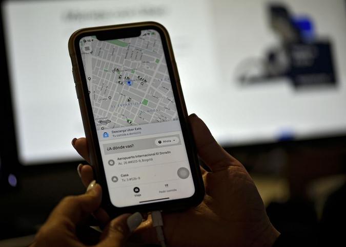 Aplicativo entrará em contato com usuários e motoristas para checar se há problemas com a viagem(foto: AFP / Juan Barreto) Aplicativo entrará em contato com usuários e motoristas para checar se há problemas com a viagem(foto: AFP / Juan Barreto)