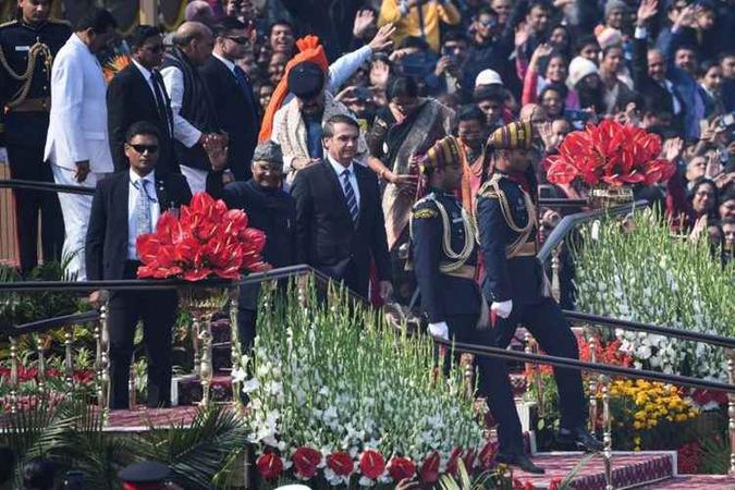 Em visita à Índia, Bolsonaro defendeu que brasileiros nos EUA devem cumprir as leis americanas(foto: AFP / Prakash SINGH) Em visita à Índia, Bolsonaro defendeu que brasileiros nos EUA devem cumprir as leis americanas(foto: AFP / Prakash SINGH)