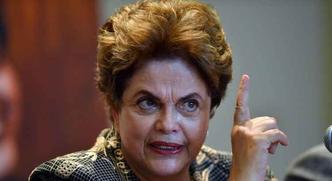 Além disso, a defesa de Dilma argumenta que 81% do que foi arrecadado por Temer acabou sendo redistribuído para outros candidatos do PMDB em oito Estados(foto: YURI CORTEZ/AFP) Além disso, a defesa de Dilma argumenta que 81% do que foi arrecadado por Temer acabou sendo redistribuído para outros candidatos do PMDB em oito Estados(foto: YURI CORTEZ/AFP)