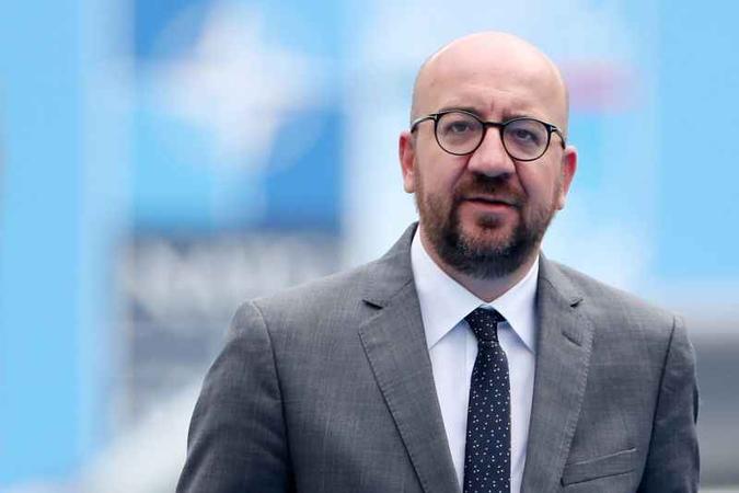O primeiro-ministro Charles Michel irá demostrar em Marrakech, na próxima semana, o apoio da Bélgica a este texto(foto: AFP) O primeiro-ministro Charles Michel irá demostrar em Marrakech, na próxima semana, o apoio da Bélgica a este texto(foto: AFP)