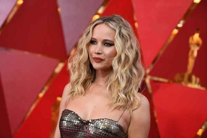 Jennifer Lawrence é protagonista da saga 'Jogos vorazes' e de 'O lado bom da vida'(foto: AFP / ANGELA WEISS) Jennifer Lawrence é protagonista da saga 'Jogos vorazes' e de 'O lado bom da vida'(foto: AFP / ANGELA WEISS)