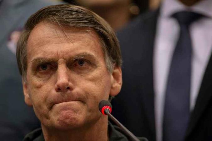 Na decisão, o corregedor determinou a notificação de Bolsonaro e as empresas para apresentarem defesa em cinco dias(foto: Mauro Pimentel/AFP) Na decisão, o corregedor determinou a notificação de Bolsonaro e as empresas para apresentarem defesa em cinco dias(foto: Mauro Pimentel/AFP)