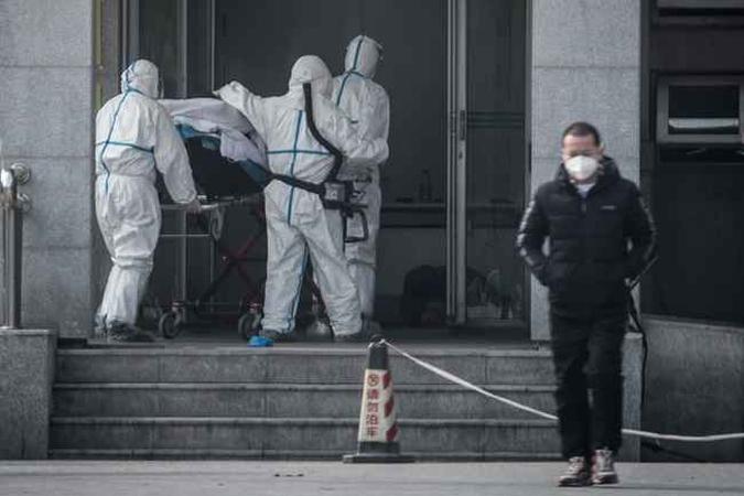 Vírus misterioso na China já tem casos confirmados na Coréia do Sul, Tailândia e Japão(foto: STR / AFP) Vírus misterioso na China já tem casos confirmados na Coréia do Sul, Tailândia e Japão(foto: STR / AFP)