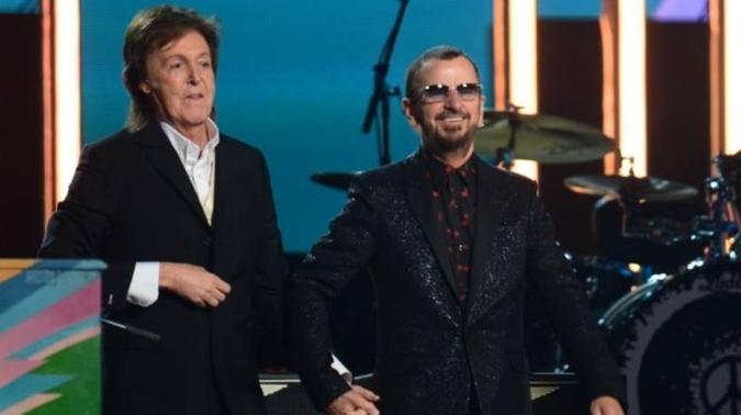 Essa é a primeira parceria dos Beatles em sete anos(foto: AFP) Essa é a primeira parceria dos Beatles em sete anos(foto: AFP)