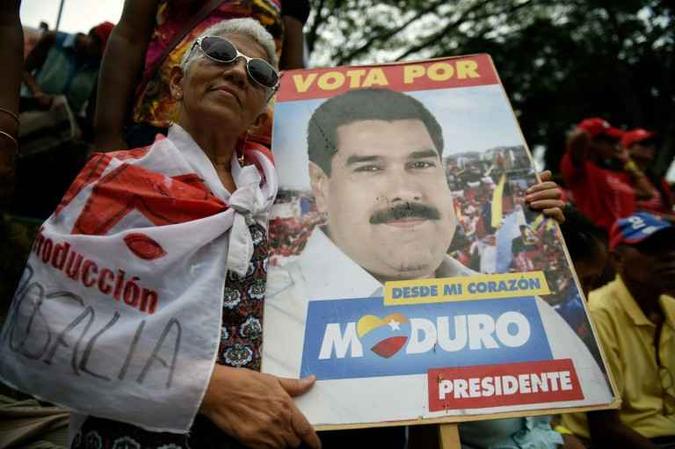 Partidária do presidente venezuelano, Nicolás Maduro(foto: Federico Parra/AFP ) Partidária do presidente venezuelano, Nicolás Maduro(foto: Federico Parra/AFP )