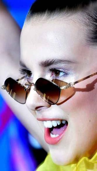 Millie Bobby Brown, a estrela de Stranger things, tem salário milionário(foto: Frazer Harrison/AFP - 13/8/17) Millie Bobby Brown, a estrela de Stranger things, tem salário milionário(foto: Frazer Harrison/AFP - 13/8/17)