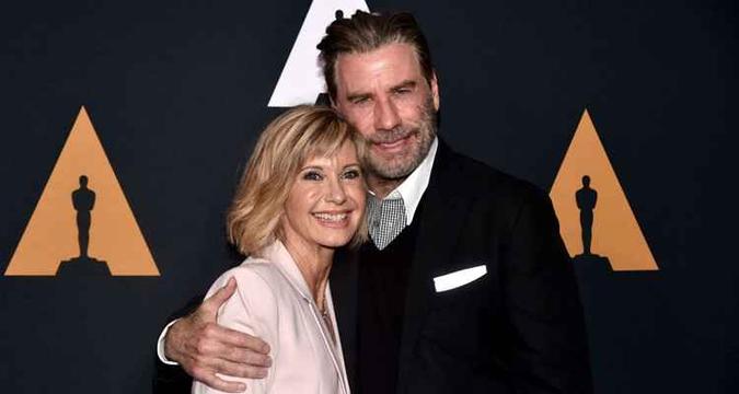John Travolta e Olivia Newton-John em comemoração de 'Grease'(foto: Getty Images) John Travolta e Olivia Newton-John em comemoração de 'Grease'(foto: Getty Images)