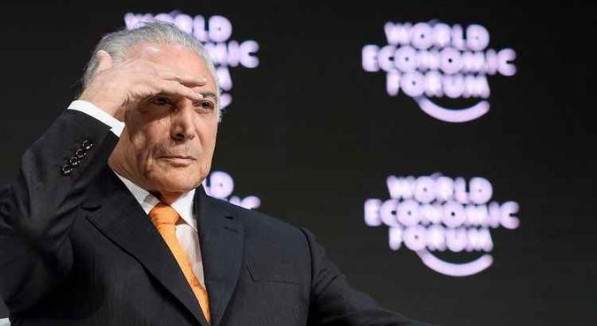 A avaliação de Temer em sua volta à Suíça é de dever comprido.(foto: FABRICE COFFRINI/CB/D.A Press) A avaliação de Temer em sua volta à Suíça é de dever comprido.(foto: FABRICE COFFRINI/CB/D.A Press)