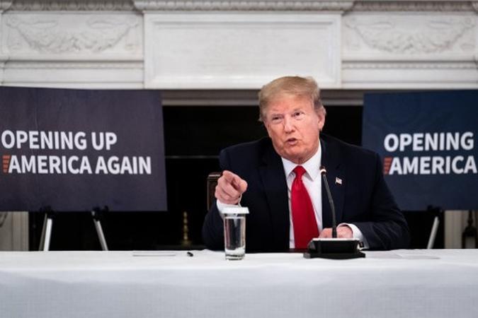 O presidente dos EUA, Donald Trump, fala durante uma reunião com executivos do setor sobre a reabertura da economia dos EUA no State Dining Room 29 de maio de 2020 em Washington, DC. (foto: POOL / GETTY IMAGES NORTH AMERICA / Getty Images via AFP) O presidente dos EUA, Donald Trump, fala durante uma reunião com executivos do setor sobre a reabertura da economia dos EUA no State Dining Room 29 de maio de 2020 em Washington, DC. (foto: POOL / GETTY IMAGES NORTH AMERICA / Getty Images via AFP)