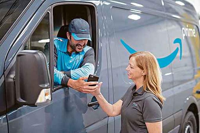 Empresa utiliza aviões, caminhões e vans para realizar suas entregas em mais de 30 países onde tem operações (foto: Júlio Vilela/Amazon/Divulgação ) Empresa utiliza aviões, caminhões e vans para realizar suas entregas em mais de 30 países onde tem operações (foto: Júlio Vilela/Amazon/Divulgação )