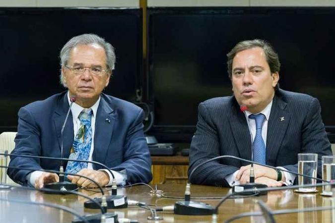 Paulo Guedes com Pedro Guimarães: bancos públicos cometeram excessos com recursos públicos(foto: Gustavo Raniere/ASCOM/Ministério da Economia) Paulo Guedes com Pedro Guimarães: bancos públicos cometeram excessos com recursos públicos(foto: Gustavo Raniere/ASCOM/Ministério da Economia)
