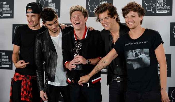Ex-integrantes da boyband One Direction (foto: Stan Honda/AFP) Ex-integrantes da boyband One Direction (foto: Stan Honda/AFP)