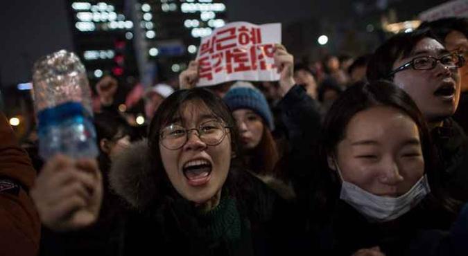 Protesto contra o governo, no centro de Seul(foto: Ed Jones/AFP) Protesto contra o governo, no centro de Seul(foto: Ed Jones/AFP)