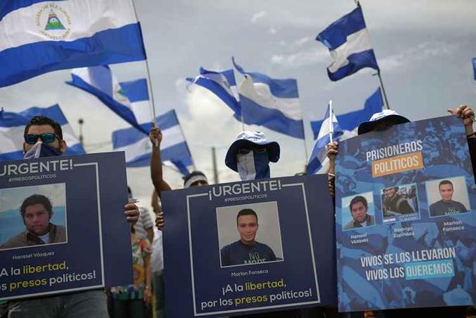 O Parlamento controlado por Ortega aprovou na semana passada uma polêmica lei que pune com entre 15 e 20 anos de prisão os envolvidos em atividades contra o governo(foto: Marvin Recinos/AFP) O Parlamento controlado por Ortega aprovou na semana passada uma polêmica lei que pune com entre 15 e 20 anos de prisão os envolvidos em atividades contra o governo(foto: Marvin Recinos/AFP)