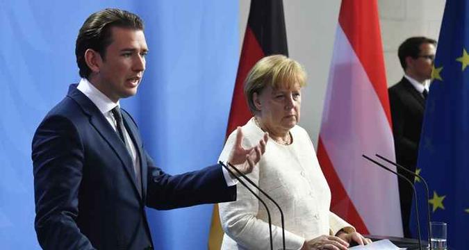 Ministro da áustria Sebastian Kurz e premiê alemã, Angela Merkel(foto: John Macdougall/ AFP) Ministro da áustria Sebastian Kurz e premiê alemã, Angela Merkel(foto: John Macdougall/ AFP)