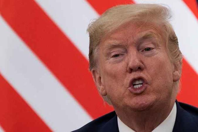A dez meses das eleições presidenciais dos Estados Unidos, presidente Donald Trump enfrenta julgamento político de impeachment que começou na última terça-feira (21/1).(foto: JIM WATSON / AFP) A dez meses das eleições presidenciais dos Estados Unidos, presidente Donald Trump enfrenta julgamento político de impeachment que começou na última terça-feira (21/1).(foto: JIM WATSON / AFP)