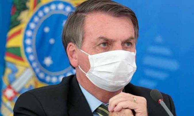 Bolsonaro: máscara contra o ''resfriadinho'' que já matou 114 no Brasil(foto: Carolina Antunes/PR) Bolsonaro: máscara contra o ''resfriadinho'' que já matou 114 no Brasil(foto: Carolina Antunes/PR)