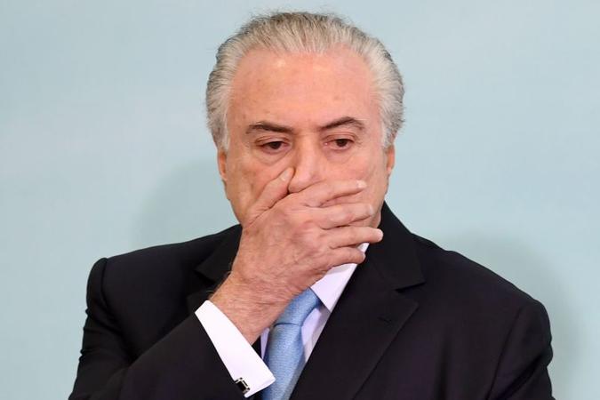 Temer é acusado por suposto crime de lavagem de dinheiro(foto: Evaristo Sa/AFP) Temer é acusado por suposto crime de lavagem de dinheiro(foto: Evaristo Sa/AFP)