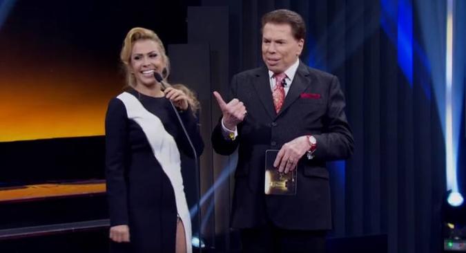 Apresentador questionou se Joelma foi 'largada' pelo ex-marido(foto: SBT/Reprodução) Apresentador questionou se Joelma foi 'largada' pelo ex-marido(foto: SBT/Reprodução)