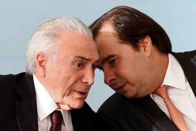 Apesar de acertada há alguns dias, a reunião não constava da agenda oficial nem de Temer nem de Maia(foto: Evaristo Sá/AFP) Apesar de acertada há alguns dias, a reunião não constava da agenda oficial nem de Temer nem de Maia(foto: Evaristo Sá/AFP)