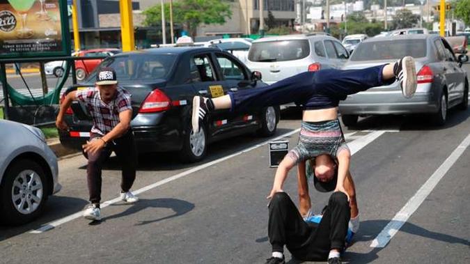 O trio é parte de um fluxo de venezuelanos que lutam para sobreviver depois de fugir do país de origem e da pior crise econômica da América Latina(foto: AP Photo/Cesar Olmos) O trio é parte de um fluxo de venezuelanos que lutam para sobreviver depois de fugir do país de origem e da pior crise econômica da América Latina(foto: AP Photo/Cesar Olmos)
