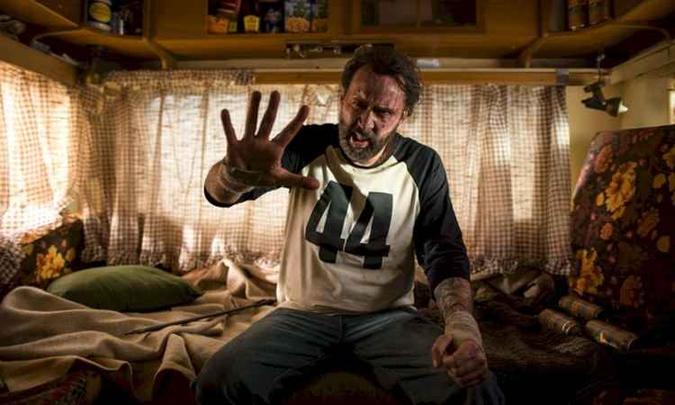 Cena de Nicolas Cage em Mandy: terror dirigido pelo americano Panos Cosmatos(foto: Universal Pictures/Divulgação) Cena de Nicolas Cage em Mandy: terror dirigido pelo americano Panos Cosmatos(foto: Universal Pictures/Divulgação)
