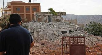 Autoridades israelenses derrubaram três casas e puniram um quarto dos palestinos que mataram um soldado e uma policial(foto: Abbas Momani/ AFP - 10/8/2017) Autoridades israelenses derrubaram três casas e puniram um quarto dos palestinos que mataram um soldado e uma policial(foto: Abbas Momani/ AFP - 10/8/2017)