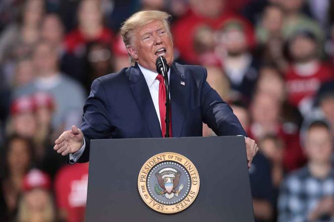 ''Nós queremos Trump, nós queremos Trump'', gritavam seus apoiadores antes do comício(foto: Scott Olson / Getty Imagens North America / AFP) ''Nós queremos Trump, nós queremos Trump'', gritavam seus apoiadores antes do comício(foto: Scott Olson / Getty Imagens North America / AFP)
