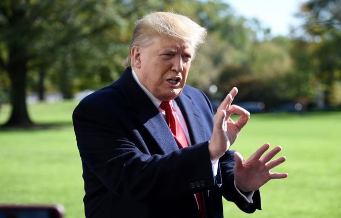 Trump aceitou fechar a fundação em dezembro do ano passado(foto: Olivier Douliery/AFP) Trump aceitou fechar a fundação em dezembro do ano passado(foto: Olivier Douliery/AFP)