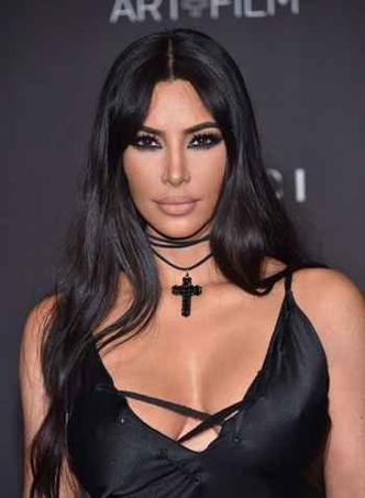 Kim Kardashian revealed to the world in the face of a child(photo by: Chris Delmas/Releases Kim Kardashian revealed to the world in the face of a child(photo by: Chris Delmas/Releases