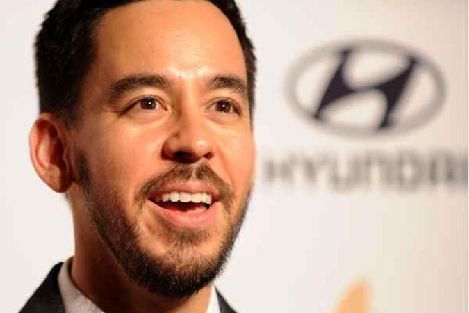 Mike Shinoda está tocando a carreira solo, mas ainda se sente perdido(foto: AFP PHOTO/Robyn BECK) Mike Shinoda está tocando a carreira solo, mas ainda se sente perdido(foto: AFP PHOTO/Robyn BECK)