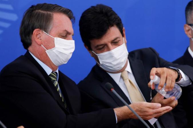 Bolsonaro ataca Mandetta porque o protagonismo do ministro torna a pandemia prioridade sobre a política (foto: AFP / Sergio LIMA ) Bolsonaro ataca Mandetta porque o protagonismo do ministro torna a pandemia prioridade sobre a política (foto: AFP / Sergio LIMA )