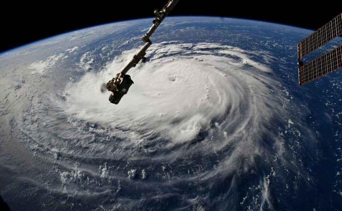 Vista do espaço do Furação Florence que se aproxima da costa leste do Estado Unidos(foto: Divulgação/NASA) Vista do espaço do Furação Florence que se aproxima da costa leste do Estado Unidos(foto: Divulgação/NASA)