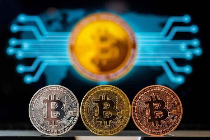 A bolsa opera com Bitcoin, Litecoin e Ethereum(foto: AFP/JACK GUEZ) A bolsa opera com Bitcoin, Litecoin e Ethereum(foto: AFP/JACK GUEZ)