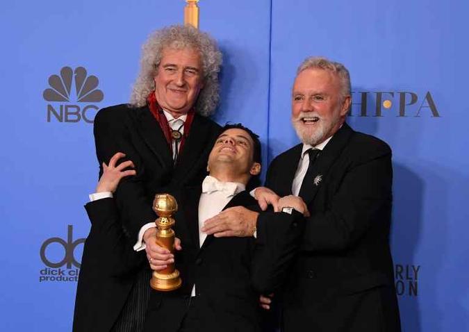 Rami Malek, vencedor do Globo de Ouro de Melhor ator em filme de drama, com os integrantes do Queen(foto: Mark Ralston/AFP) Rami Malek, vencedor do Globo de Ouro de Melhor ator em filme de drama, com os integrantes do Queen(foto: Mark Ralston/AFP)