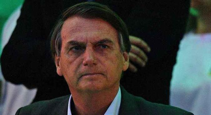 Bolsonaro chegou a brincar com a dificuldade de formar alianças e conseguir um vice de outro partido(foto: Carl de Souza/AFP) Bolsonaro chegou a brincar com a dificuldade de formar alianças e conseguir um vice de outro partido(foto: Carl de Souza/AFP)
