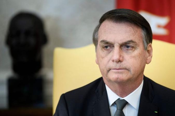 Em live, Bolsonaro ainda elogiou o Legislativo e Judiciário (foto: Brendan Smialowski/AFP) Em live, Bolsonaro ainda elogiou o Legislativo e Judiciário (foto: Brendan Smialowski/AFP)